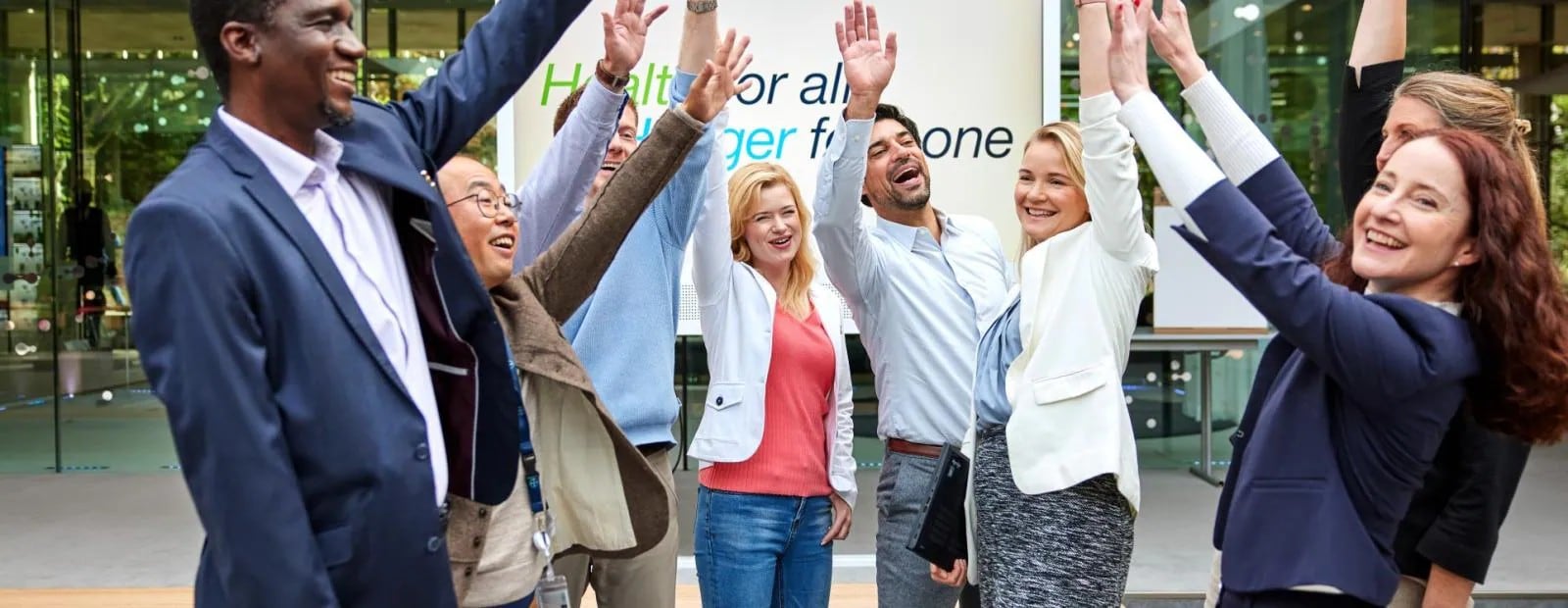 people raising their hands