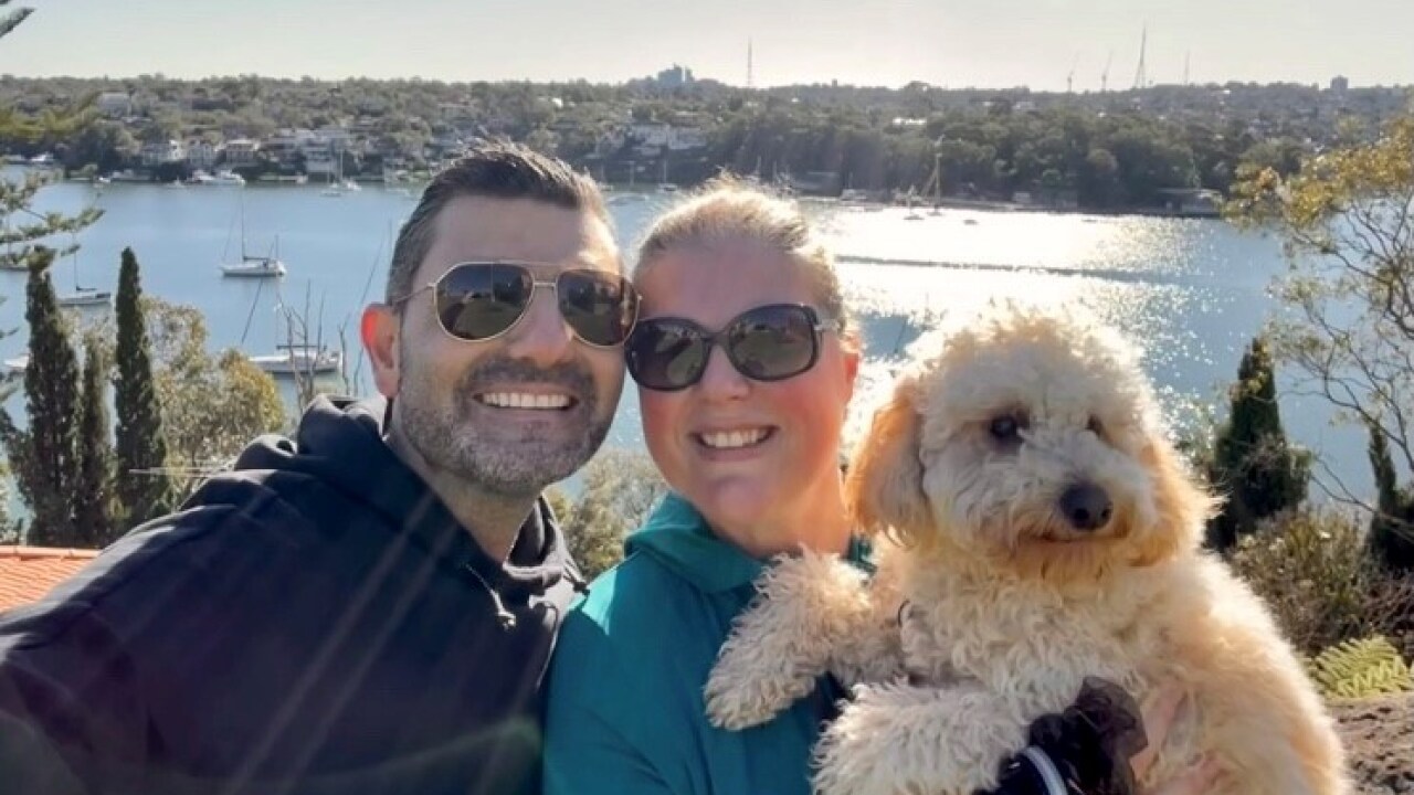 couple with a dog