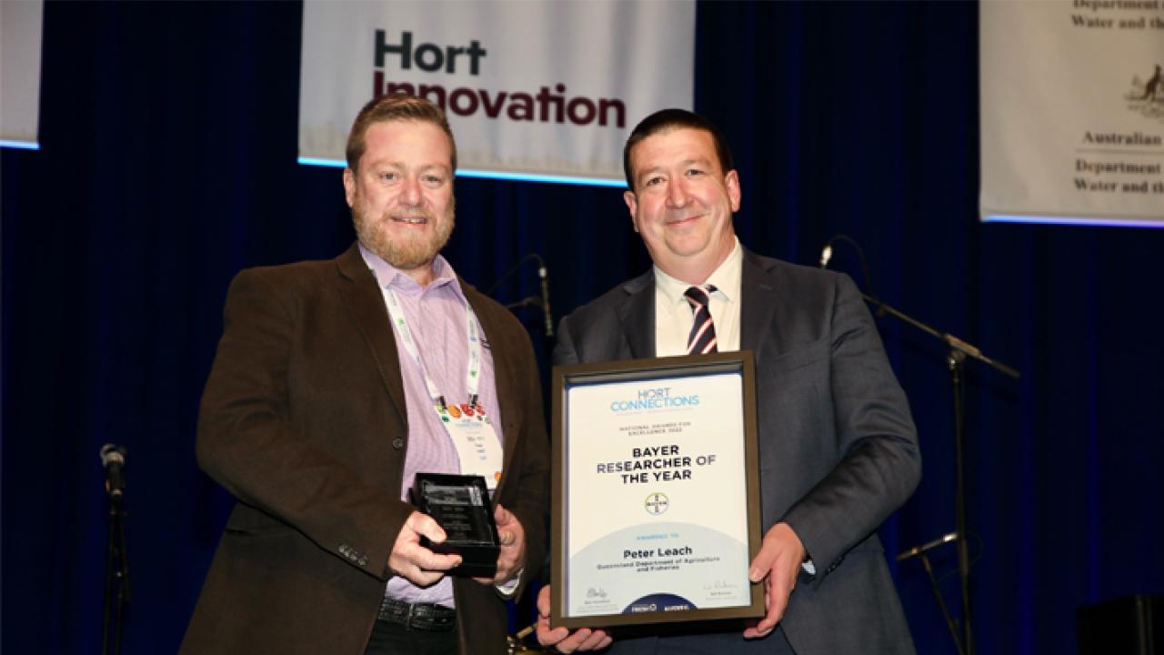 Peter Leach, Researcher of the Year (left) & Tony May, Head of Customer Marketing for Bayer Crop Science (right)