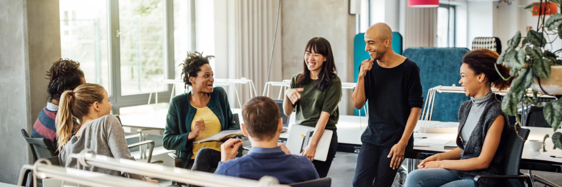 group of people sitting and chatting